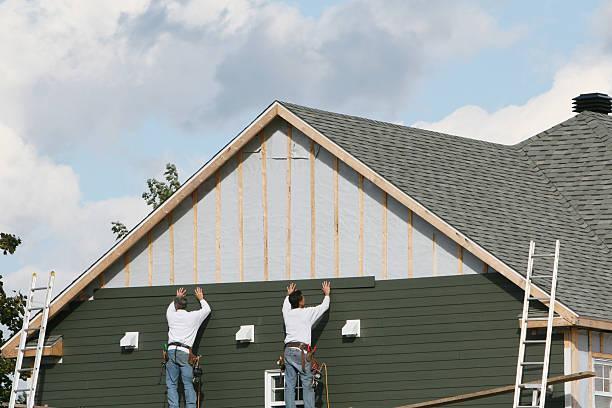 Professional Siding Repair technician working in Baldwin, NY